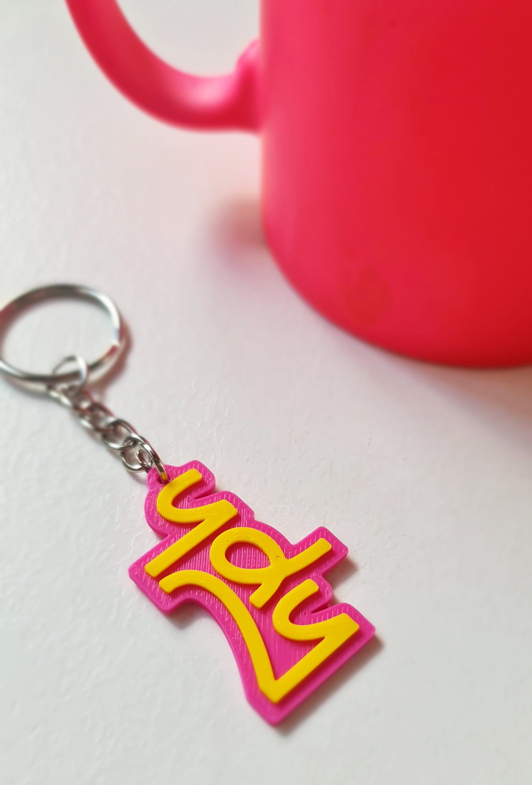 Porte-clés rose et jaune